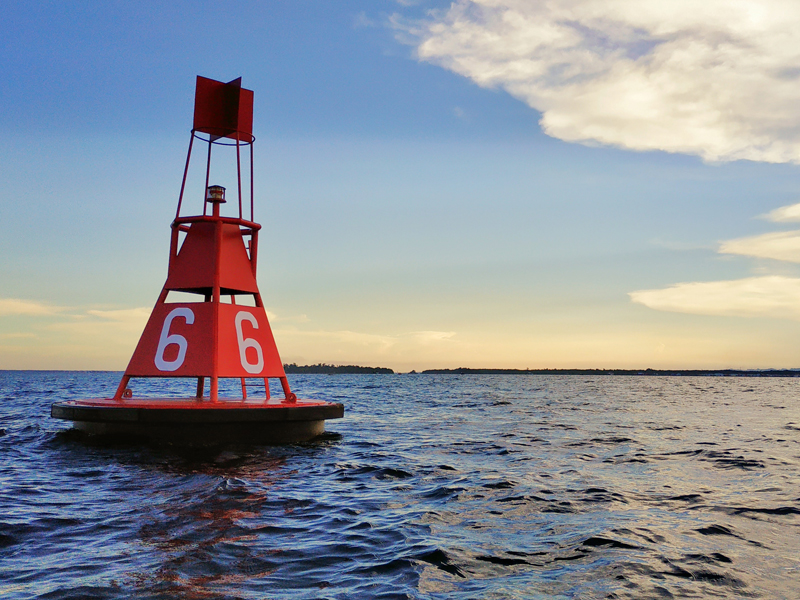 Bouy at sunset