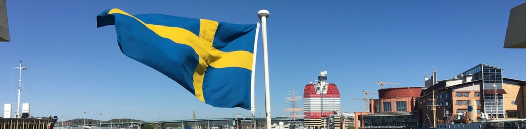 Swedish flag swaying in the wind on a sunny day