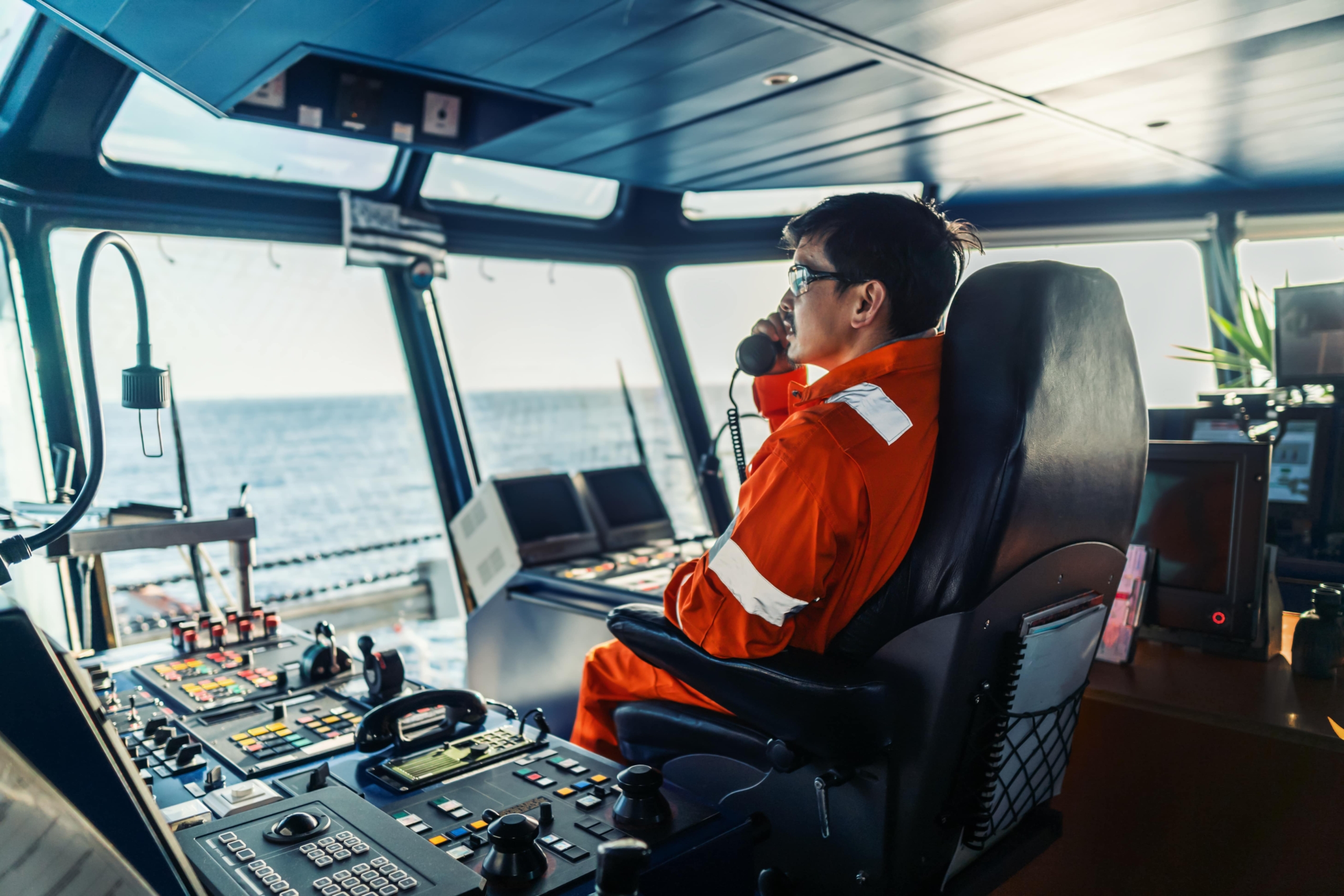 Filipino deck officer on bridge